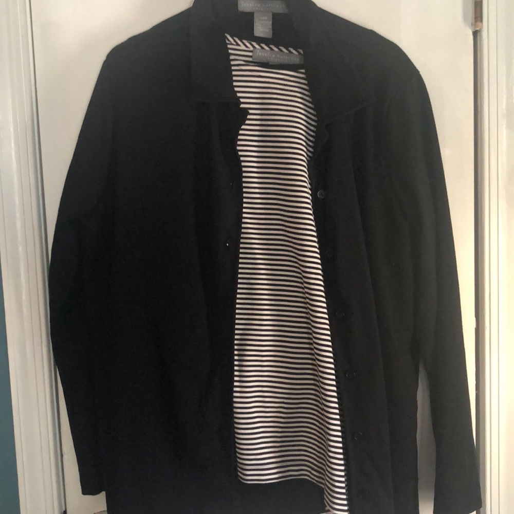 Pant suit with shirt, pants, and button up jacket.